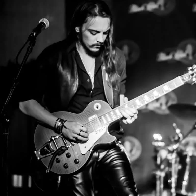 Rob Thompson live blues rock performance at a corporate event in the Eastern Cape